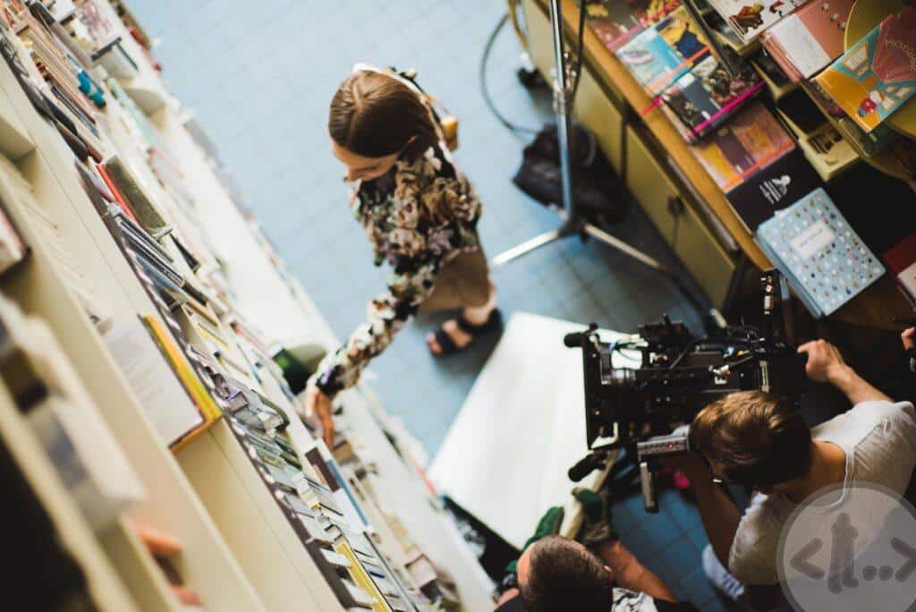 filming a woman at library