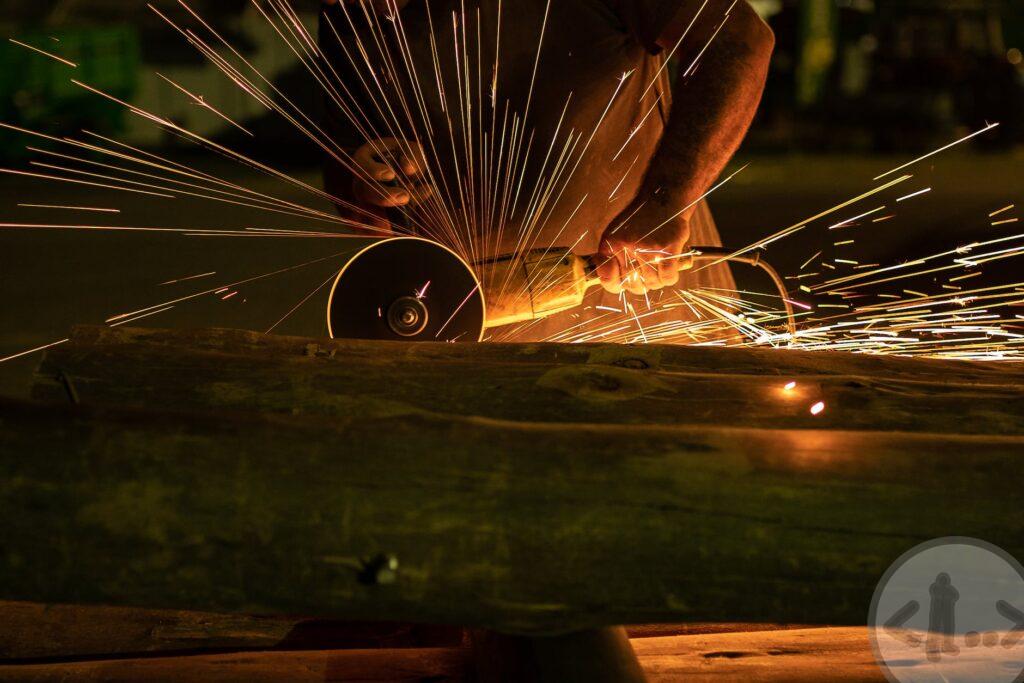 person using a grinder