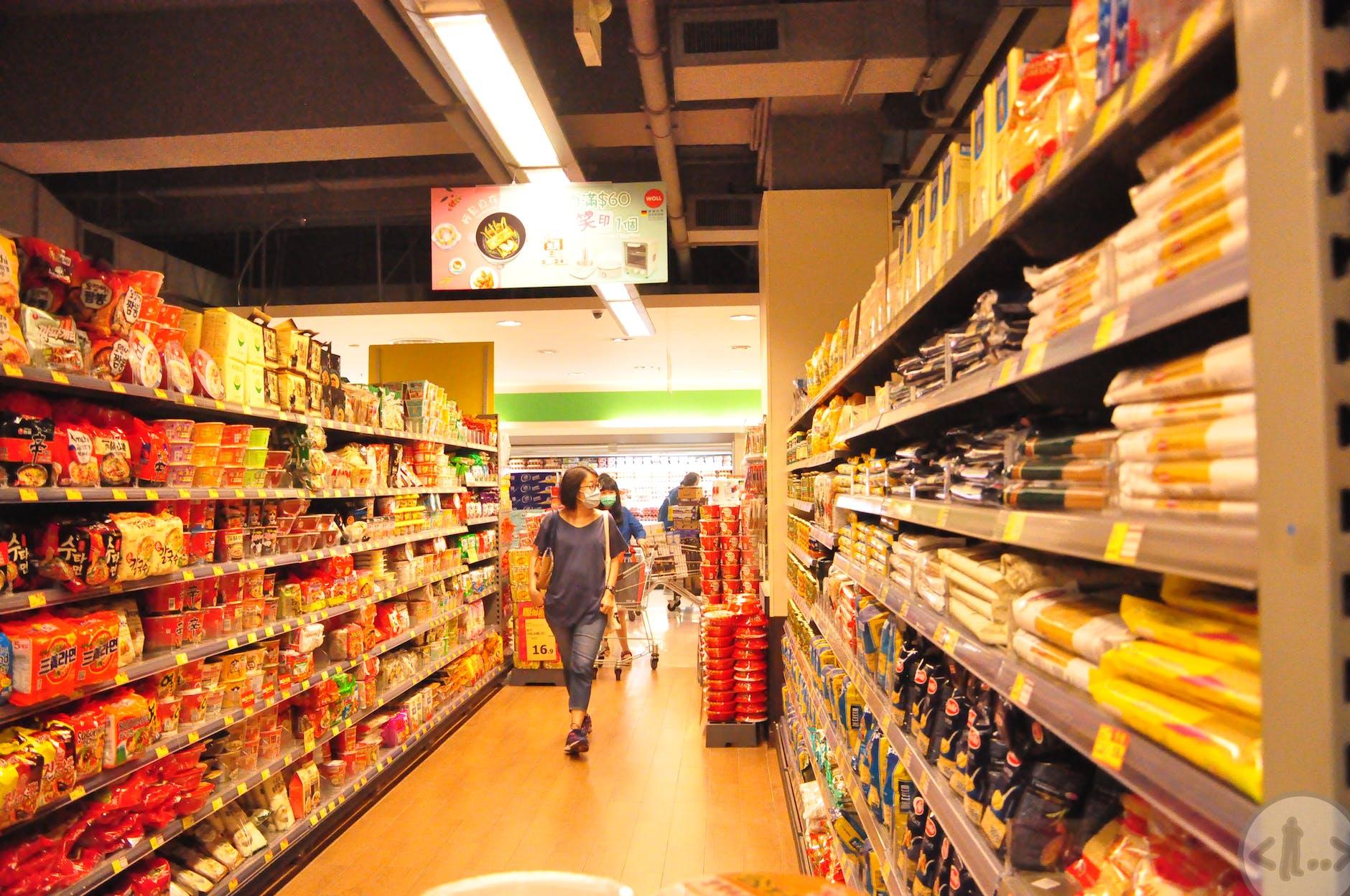 female customer choosing products in market